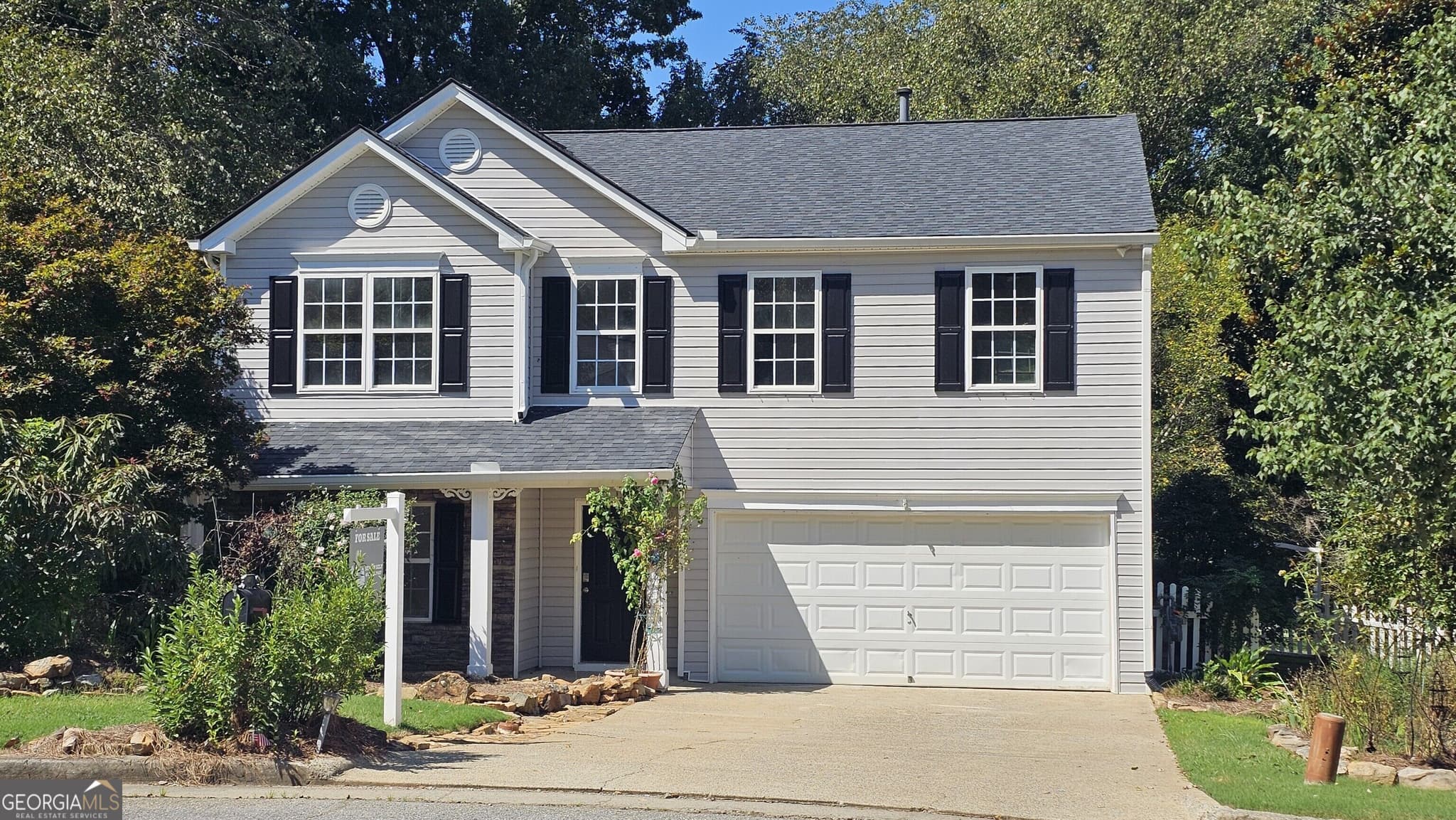 4 bedroom, 2.5 bathroom, 2,854 sq ft single family residence for sale at 528 Lazy River Lane, Woodstock, GA 30188