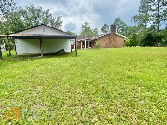 3 bedroom, 2 bathroom, 1,974 sq ft single family residence for sale at 66 W Tenth Street, Helena, GA 31037 — photo 9