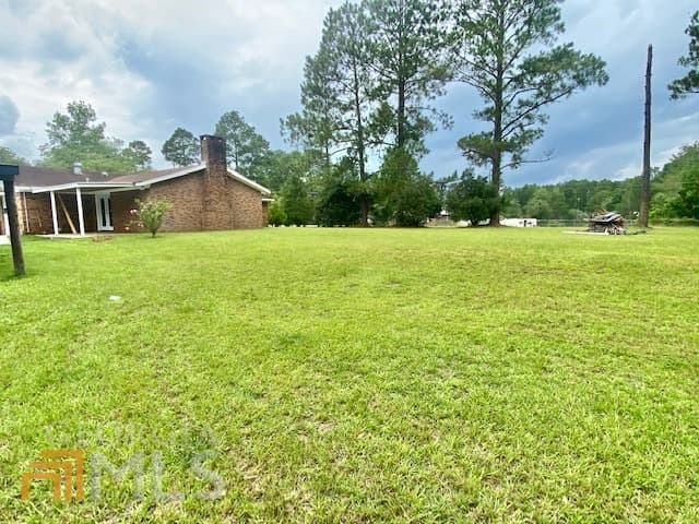 3 bedroom, 2 bathroom, 1,974 sq ft single family residence for sale at 66 W Tenth Street, Helena, GA 31037 — photo 10