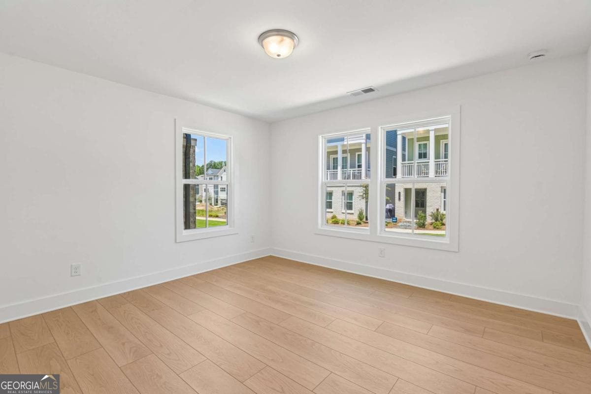 4 bedroom, 3.5 bathroom, 1,820 sq ft single family residence for sale at 119 Pinecone Parkway, Alpharetta, GA 30022 — photo 8