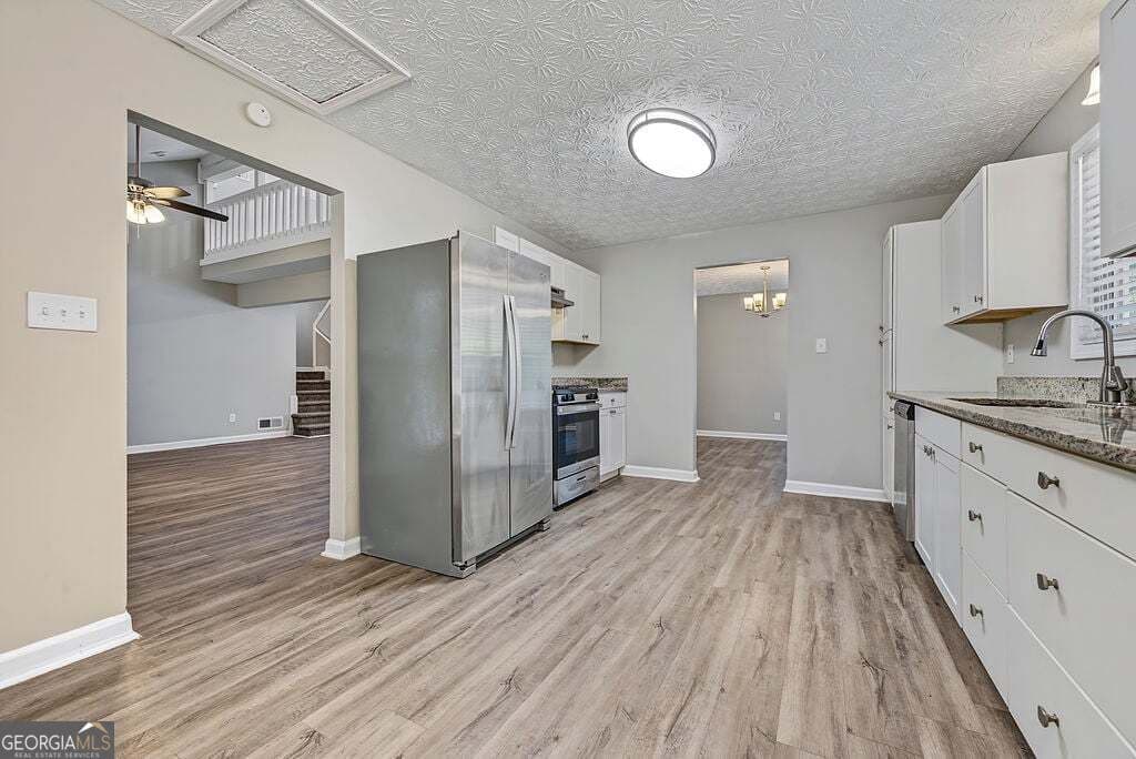 4 bedroom, 2.5 bathroom, 3,560 sq ft single family residence for sale at 2638 Tritt Springs Trace, Marietta, GA 30062 — photo 8