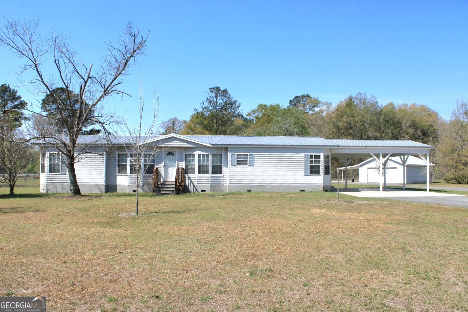 3 bedroom, 2 bathroom, 1,792 sq ft manufactured home,single family residence for sale at 1606 Homestead Drive, Ellabell, GA 31308 — photo 2