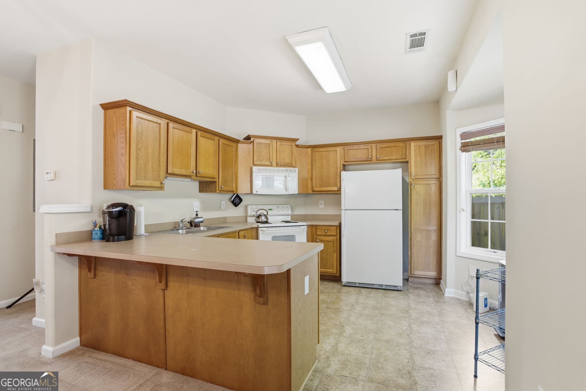2 bedroom, 2.5 bathroom, 1,292 sq ft townhouse for sale at 5216 Birch Court, Oakwood, GA 30566 — photo 10