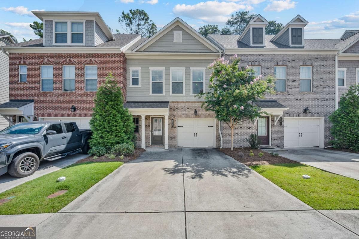 3 bedroom, 2.5 bathroom, 1,897 sq ft townhouse for sale at 211 Mahone Drive, Lilburn, GA 30047 — photo 1 of 32