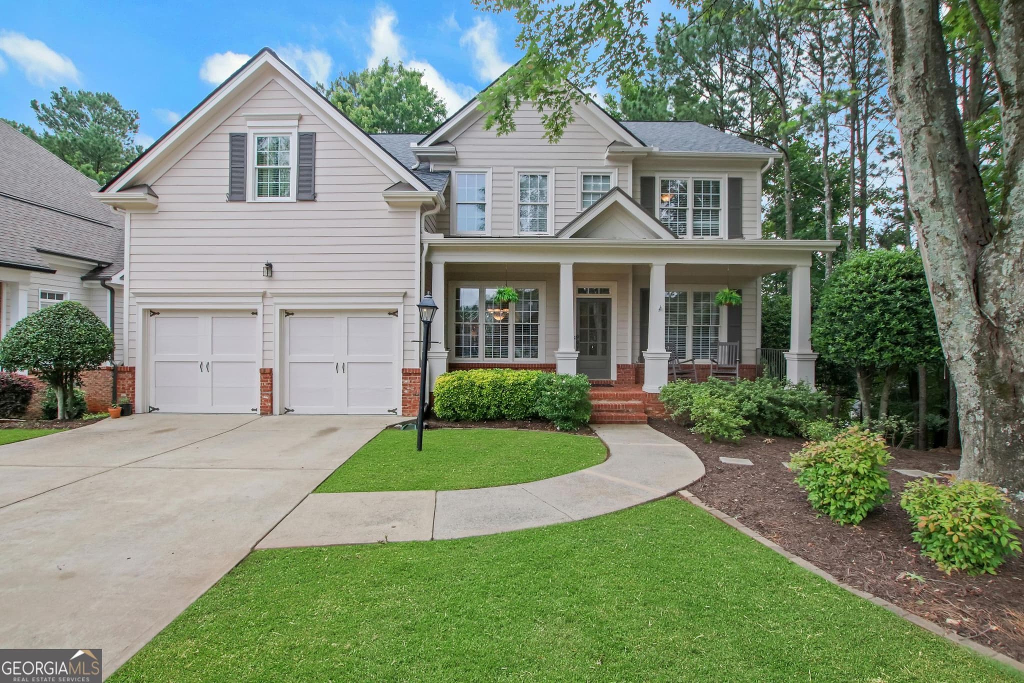 5 bedroom, 4.5 bathroom, 4,053 sq ft single family residence for sale at 5218 Davis Love Drive, Cumming, GA 30041 — photo 1 of 56