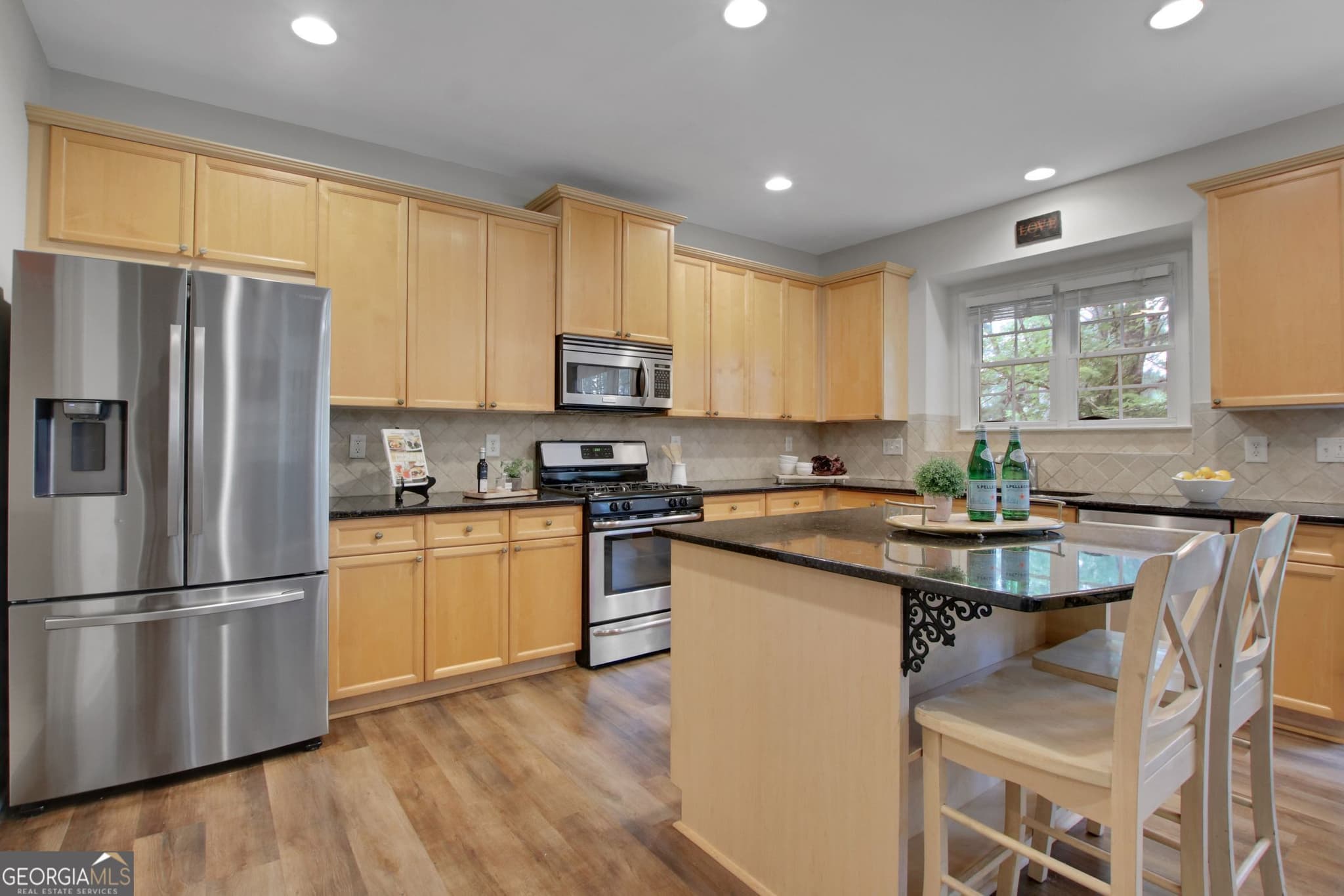 5 bedroom, 4.5 bathroom, 4,053 sq ft single family residence for sale at 5218 Davis Love Drive, Cumming, GA 30041 — photo 9