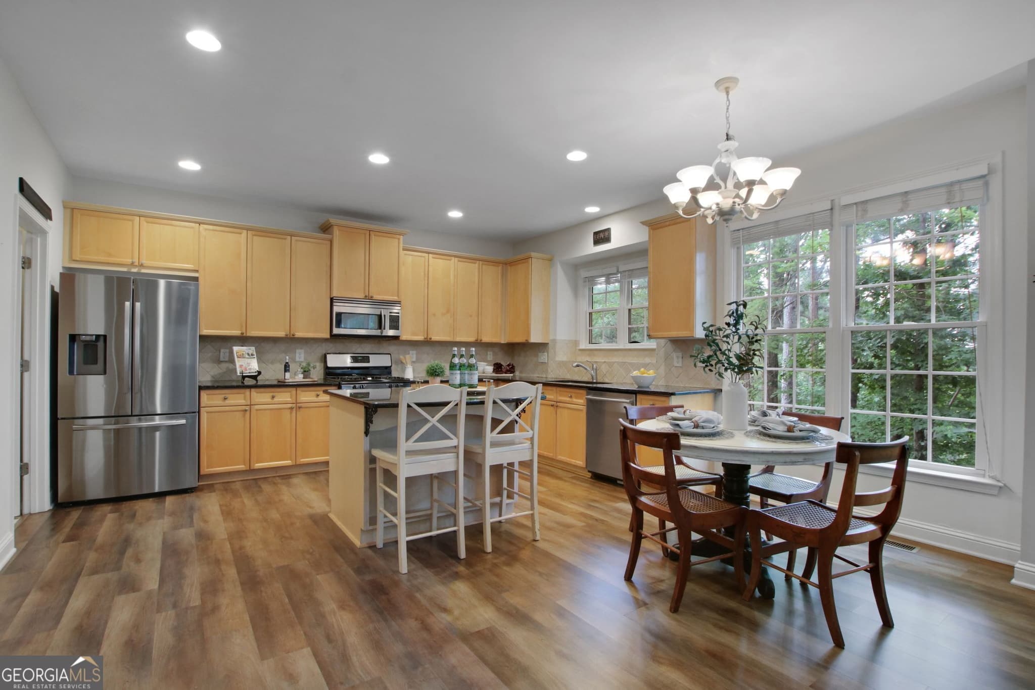 5 bedroom, 4.5 bathroom, 4,053 sq ft single family residence for sale at 5218 Davis Love Drive, Cumming, GA 30041 — photo 8