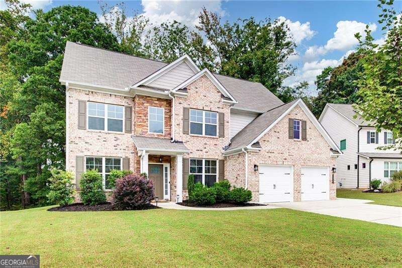 6 bedroom, 5 bathroom, 4,306 sq ft single family residence for sale at 2445 Oxenwood Drive, Marietta, GA 30064 — photo 2