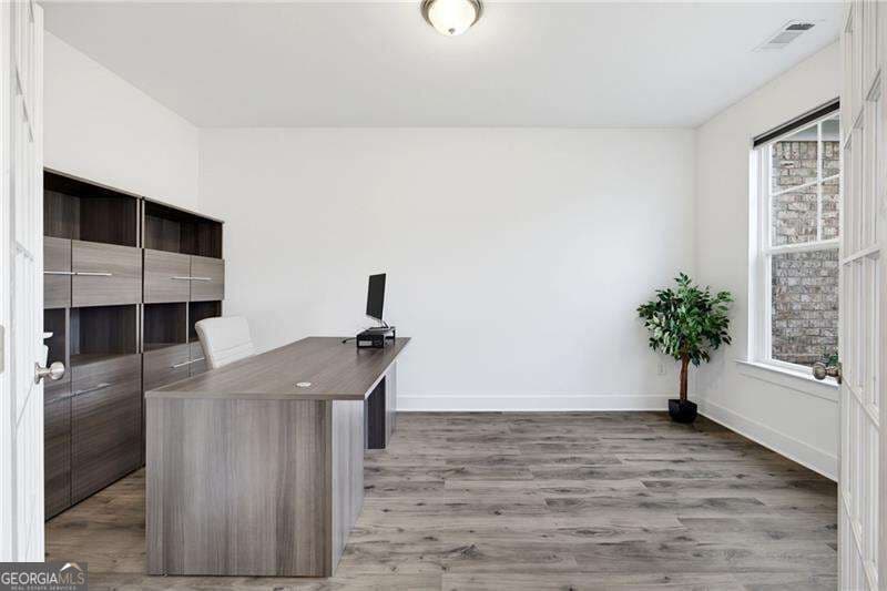 6 bedroom, 5 bathroom, 4,306 sq ft single family residence for sale at 2445 Oxenwood Drive, Marietta, GA 30064 — photo 7