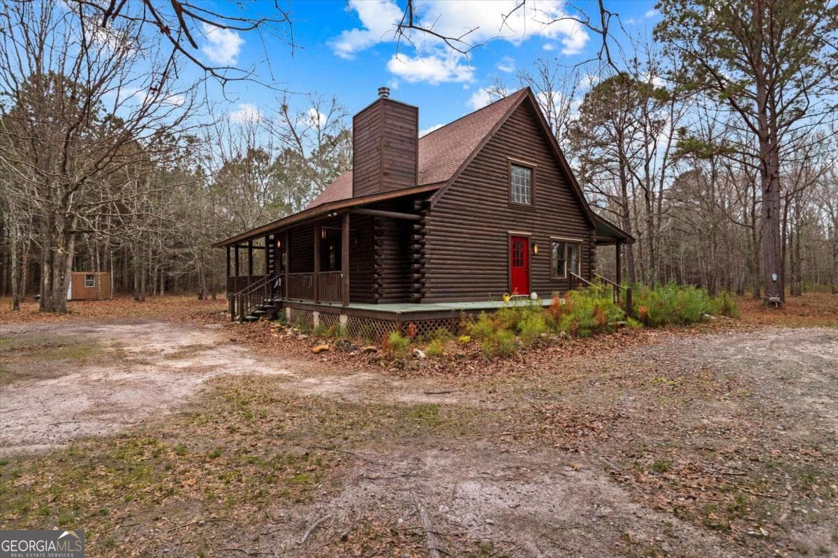 3 bedroom, 2 bathroom, 1,814 sq ft cabin,farm for sale at 250 Lee Paul Road, Hawkinsville, GA 31036 — photo 2