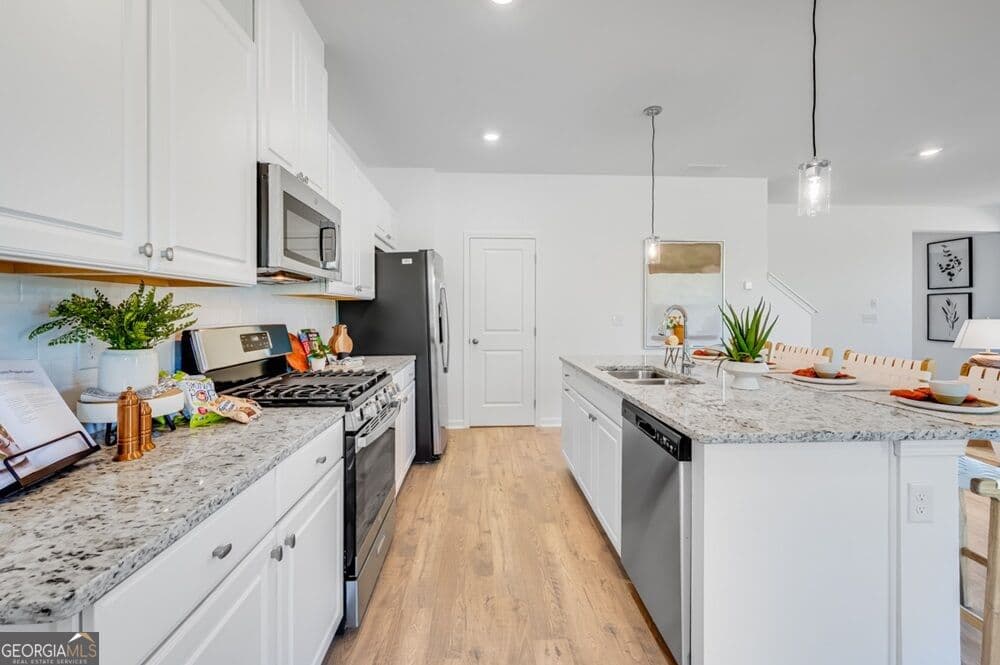 5 bedroom, 3 bathroom, 2,598 sq ft single family residence for sale at 2380 Dreycott Lane, Lawrenceville, GA 30043 — photo 8