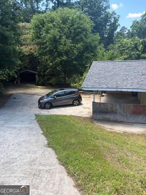 3 bedroom, 1 bathroom, 1,025 sq ft single family residence for sale at 5906 Oakdale Road, Mableton, GA 30126 — photo 1 of 15