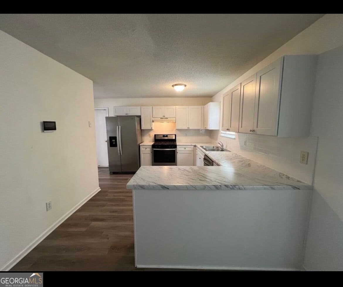 4 bedroom, 2.5 bathroom, 1,980 sq ft single family residence for sale at 4538 Idlewood Park, Lithonia, GA 30038 — photo 7