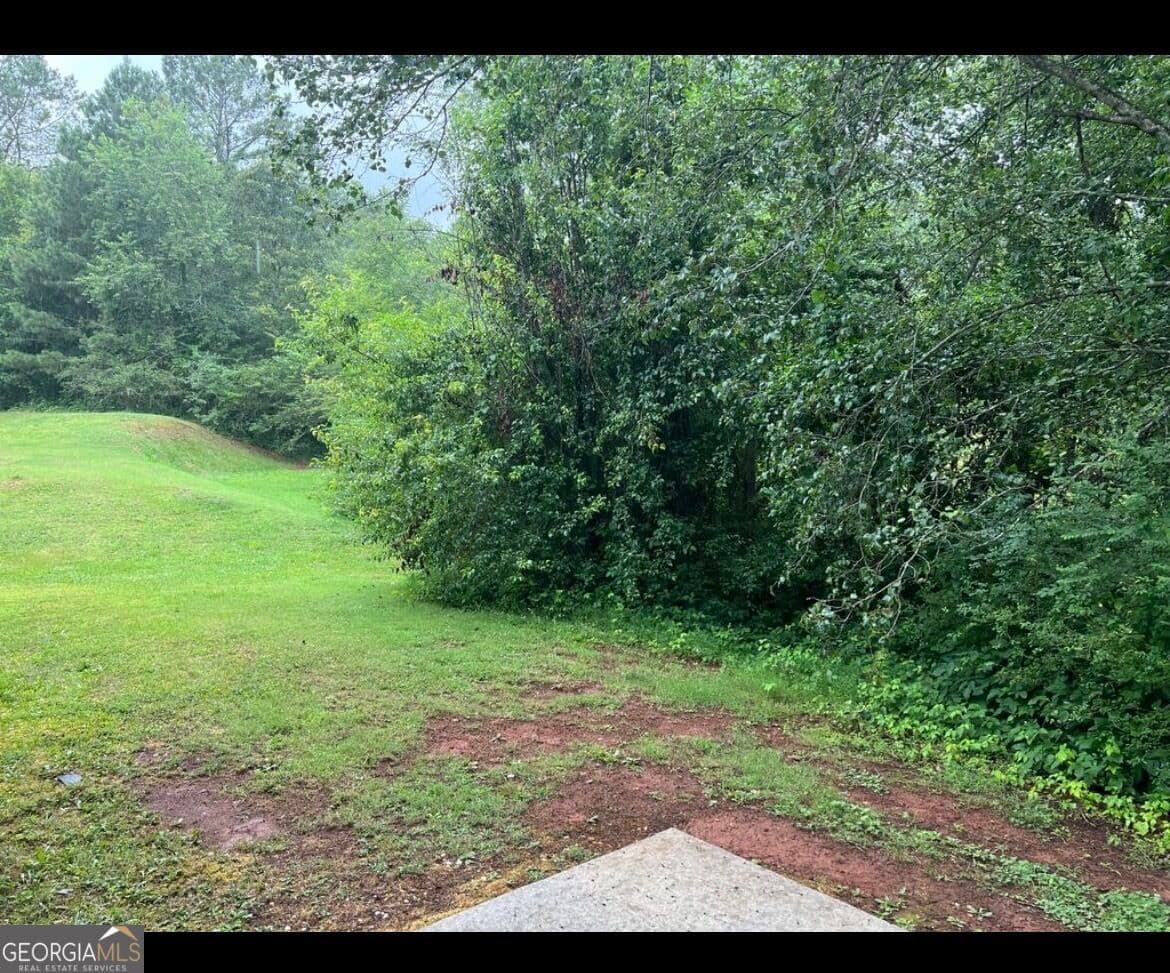 4 bedroom, 2.5 bathroom, 1,980 sq ft single family residence for sale at 4538 Idlewood Park, Lithonia, GA 30038 — photo 3