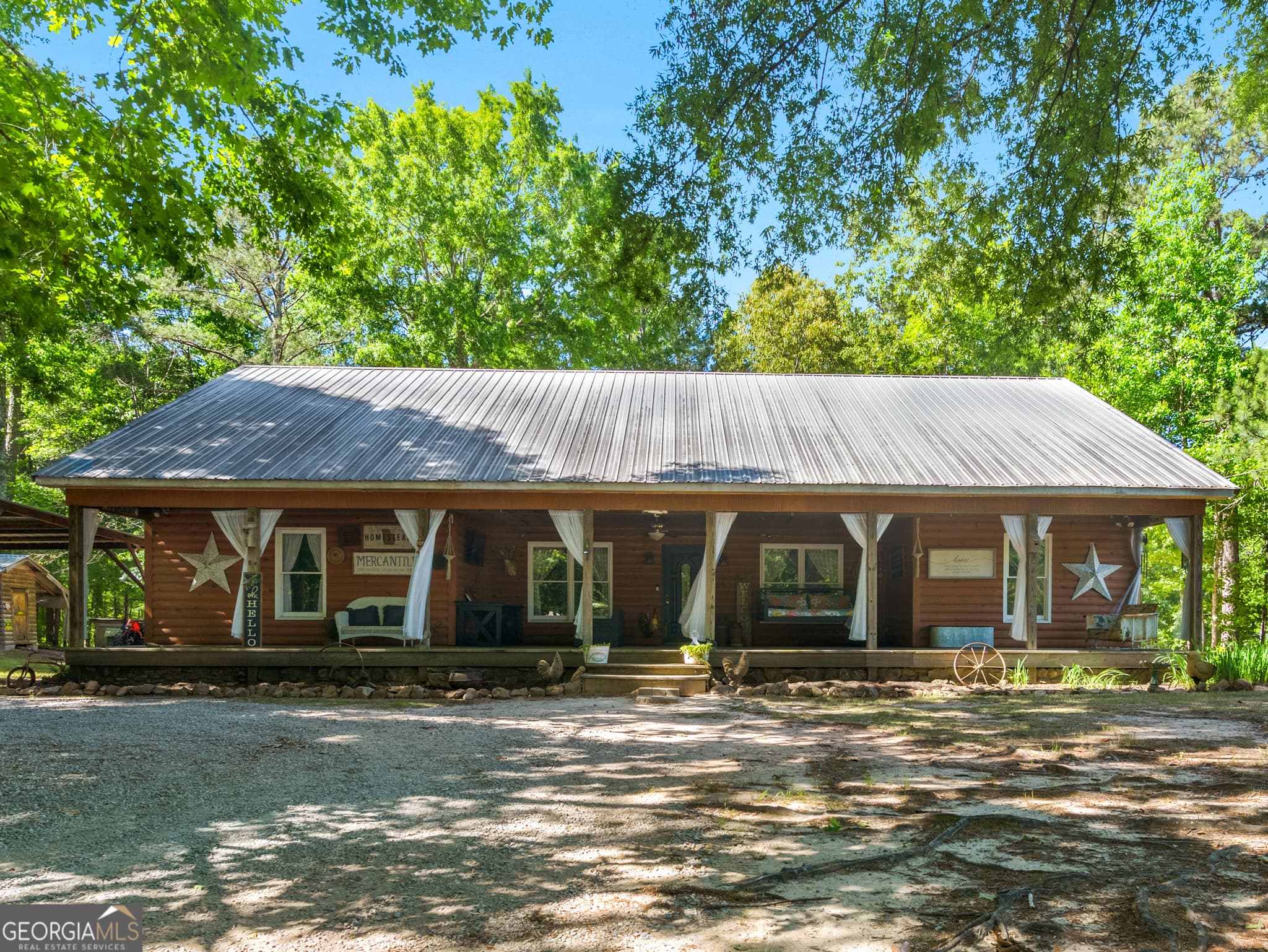 4 bedroom, 2 bathroom, 2,556 sq ft cabin,single family residence sold at 1018 Grandview Road, Mansfield, GA 30055