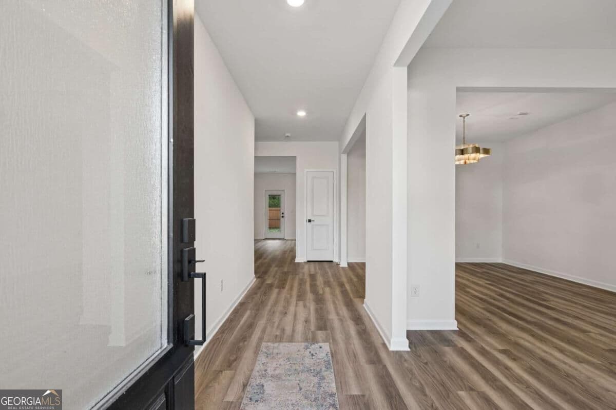 4 bedroom, 2.5 bathroom, 2,556 sq ft single family residence for sale at 3955 Saddle Bag Court, Dacula, GA 30019 — photo 3