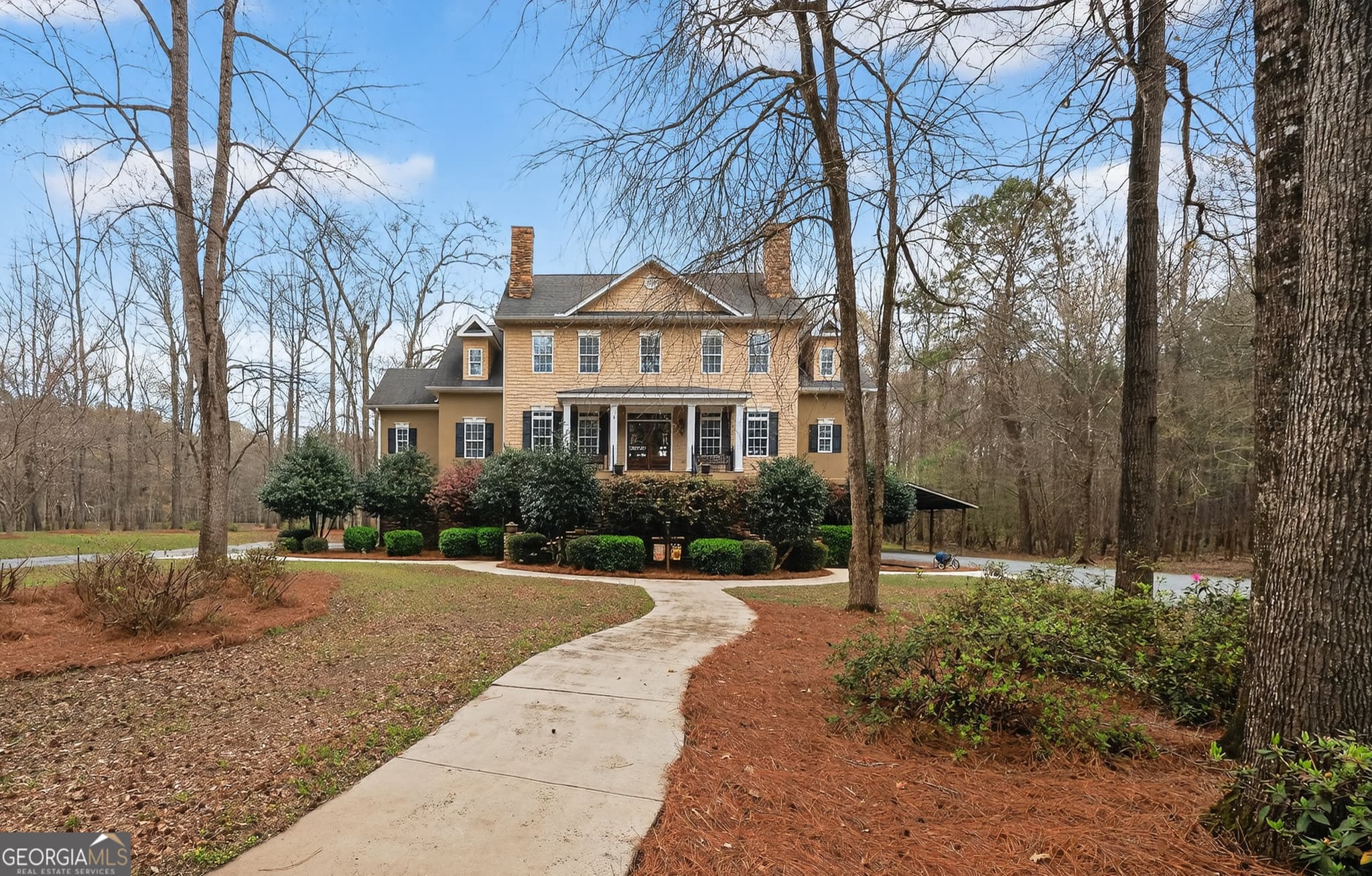 4 bedroom, 3.5 bathroom, 3,356 sq ft single family residence for sale at 6243 Highway 83, Forsyth, GA 31029 — photo 2
