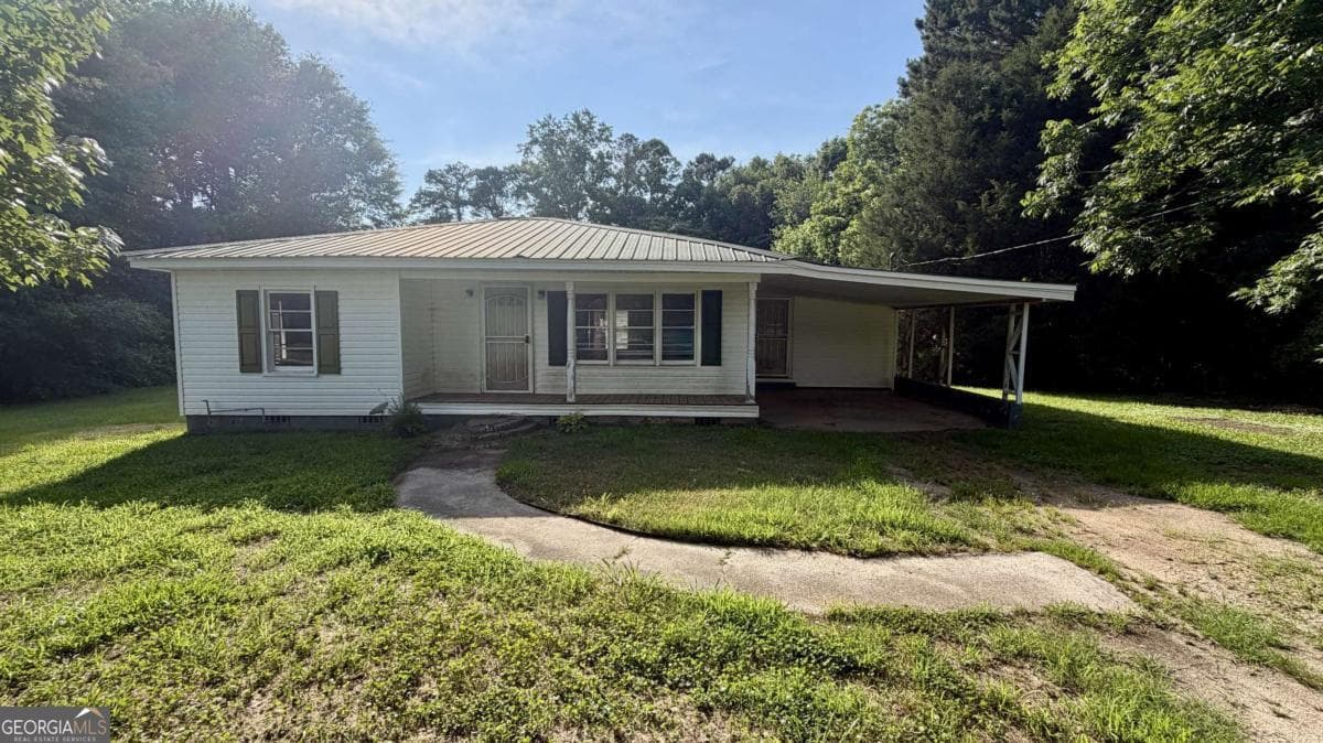 2 bedroom, 1 bathroom, 970 sq ft single family residence sold at 1477 S Highway 100, Bowdon, GA 30108