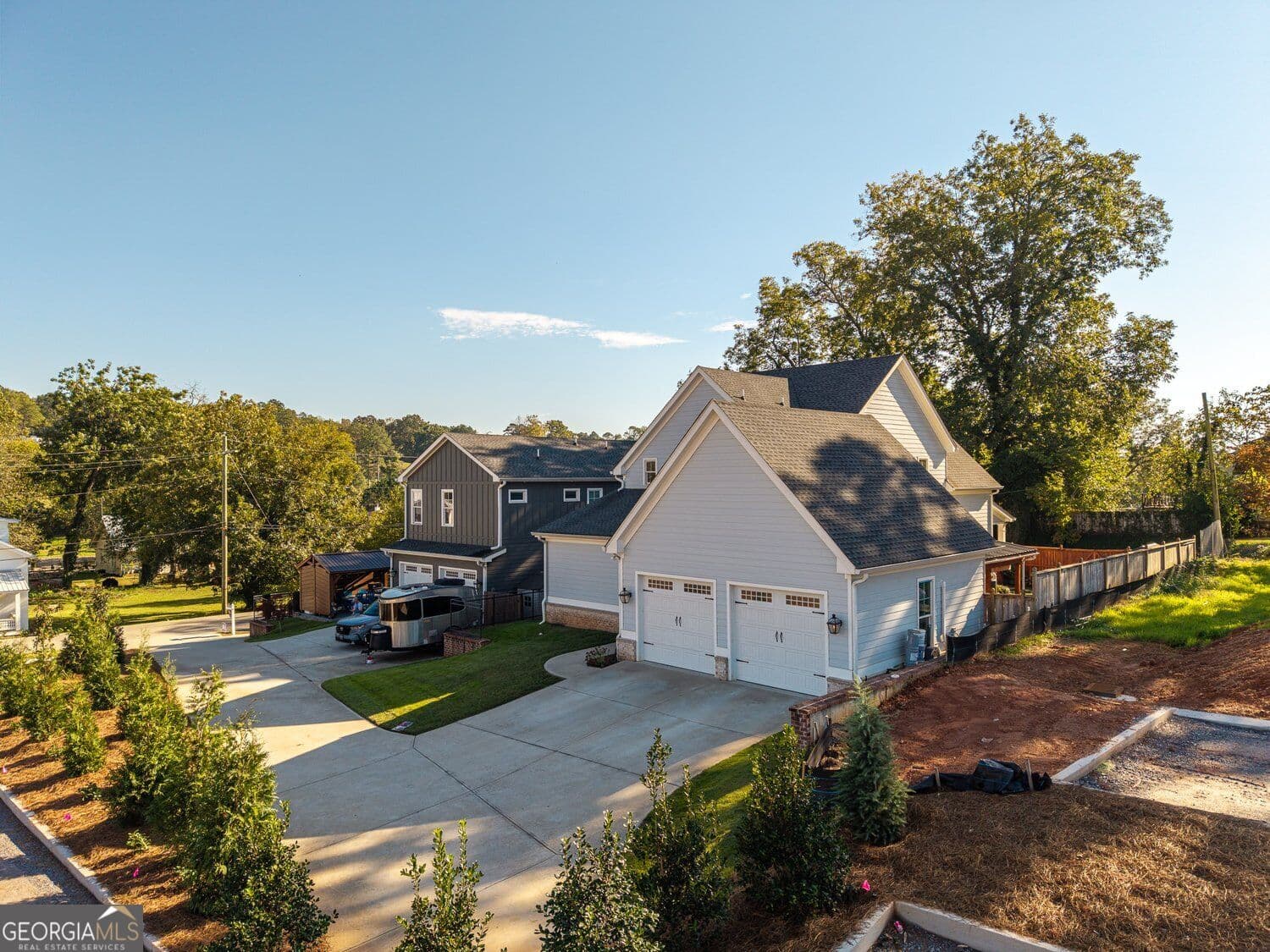 5 bedroom, 4.5 bathroom, 3,200 sq ft single family residence for sale at 190 Chestnut Street, Ball Ground, GA 30107 — photo 3