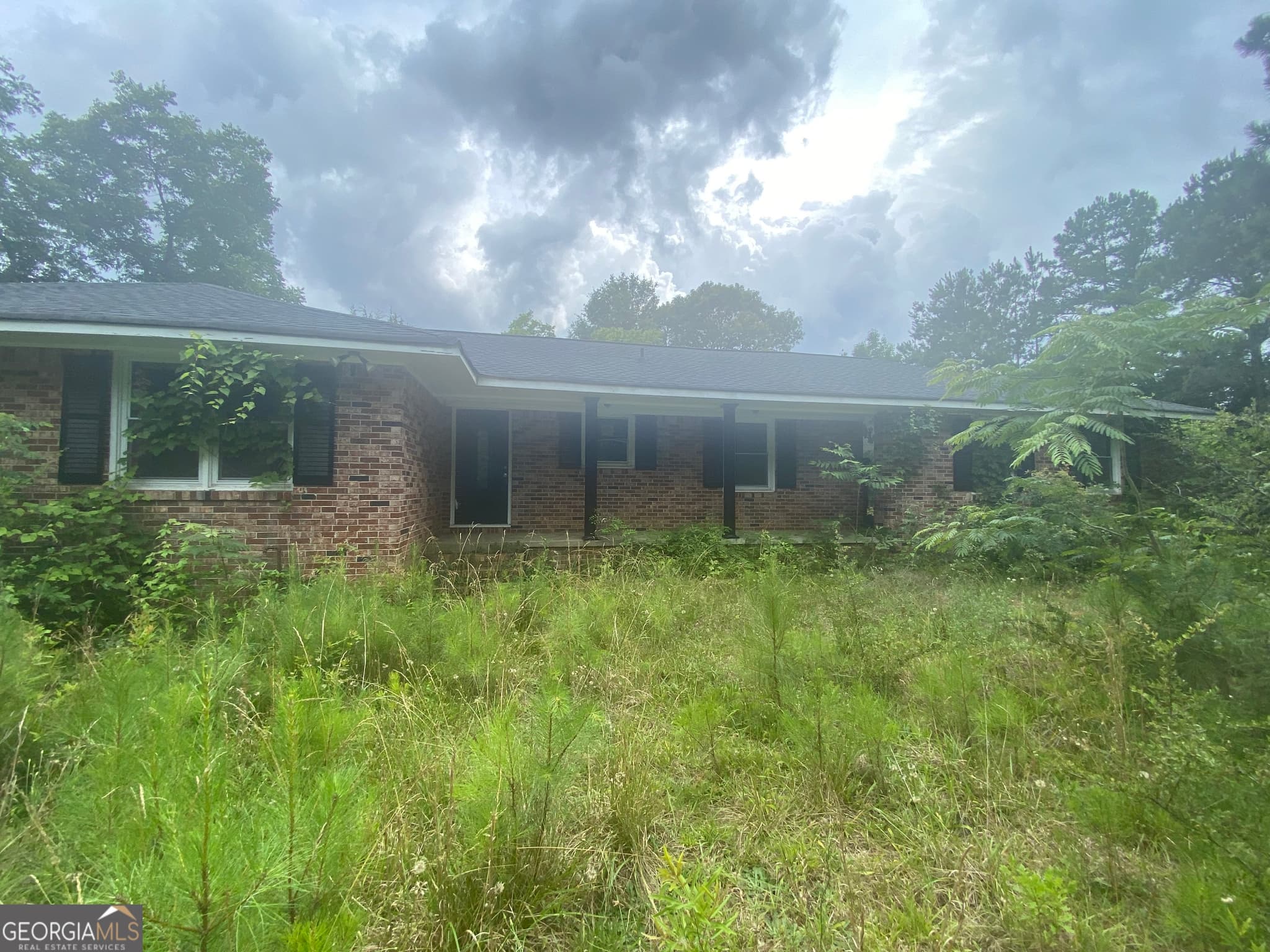 3 bedroom, 3 bathroom, 1,352 sq ft single family residence for sale at 15923 Highway 36, Covington, GA 30014 — photo 2
