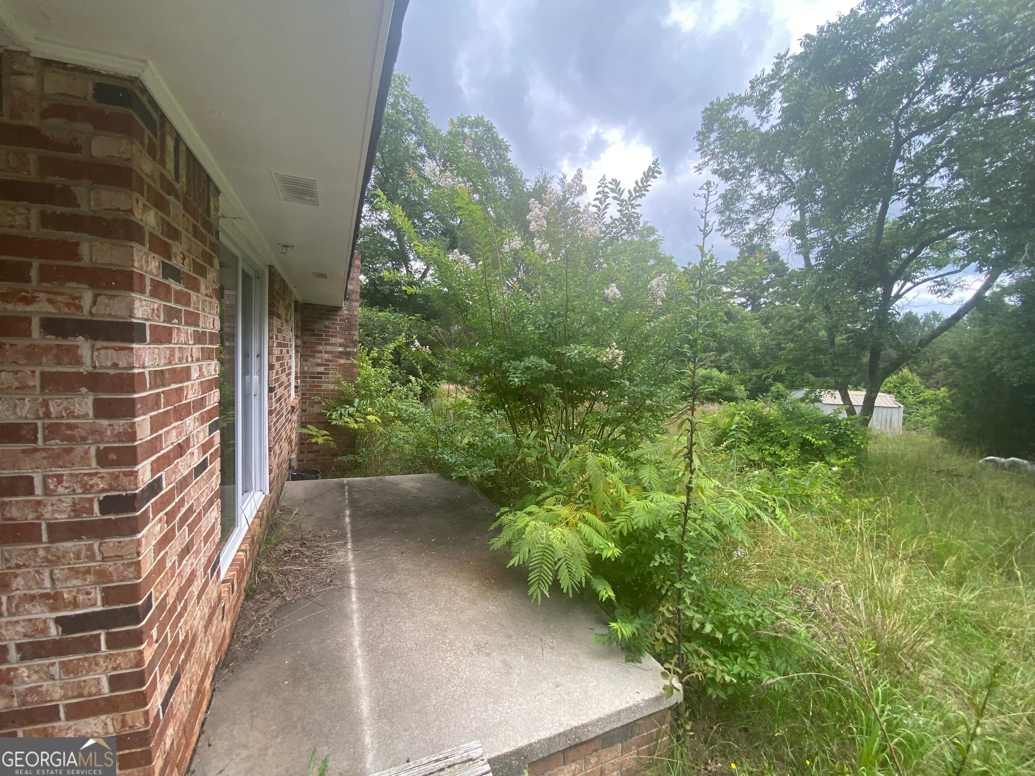3 bedroom, 3 bathroom, 1,352 sq ft single family residence for sale at 15923 Highway 36, Covington, GA 30014 — photo 6