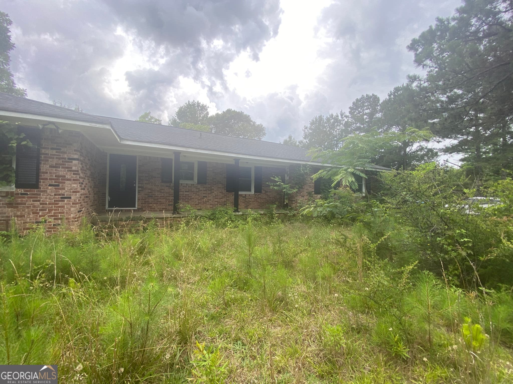 3 bedroom, 3 bathroom, 1,352 sq ft single family residence for sale at 15923 Highway 36, Covington, GA 30014 — photo 3