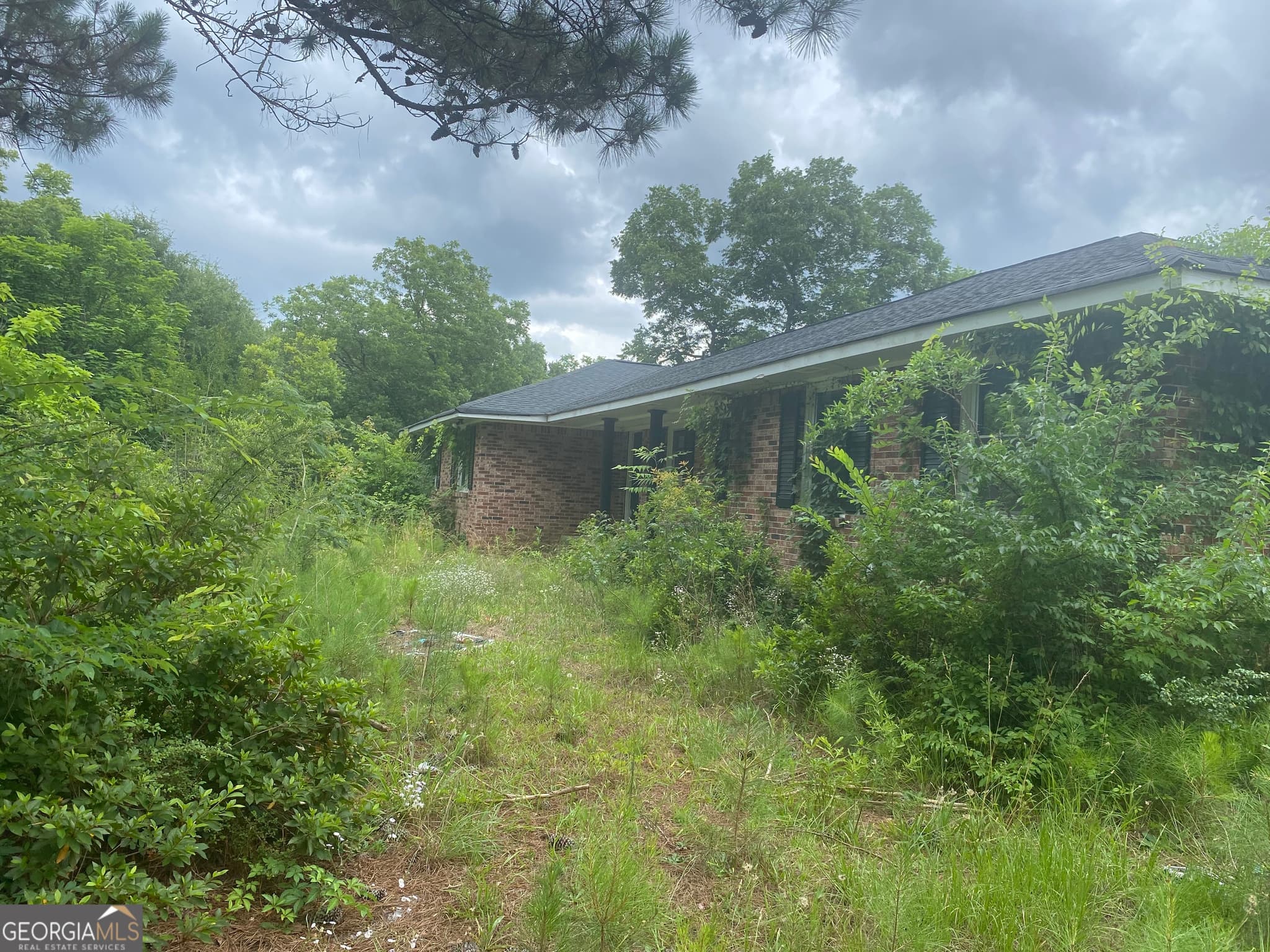 3 bedroom, 3 bathroom, 1,352 sq ft single family residence for sale at 15923 Highway 36, Covington, GA 30014 — photo 5