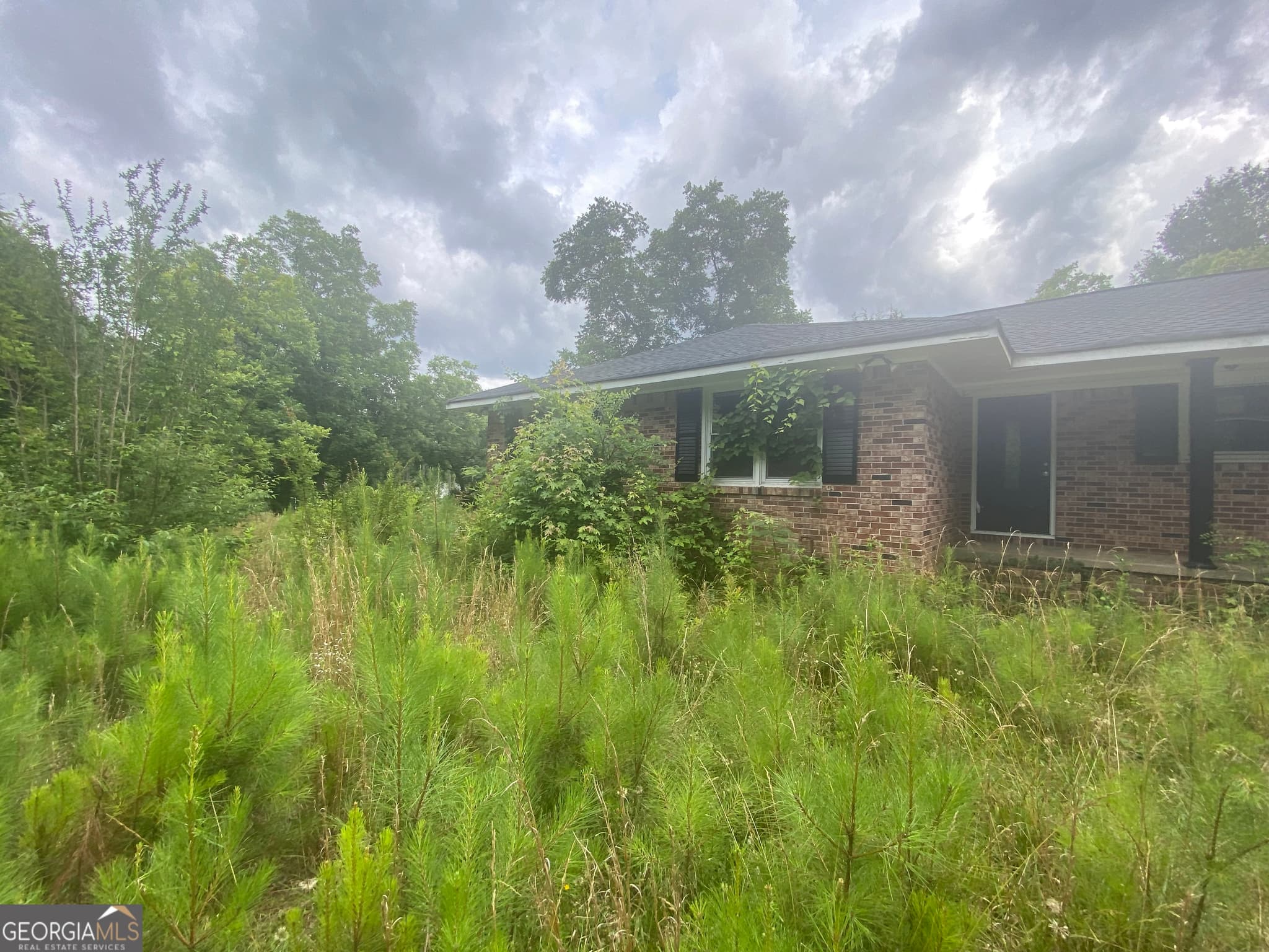 3 bedroom, 3 bathroom, 1,352 sq ft single family residence for sale at 15923 Highway 36, Covington, GA 30014 — photo 4