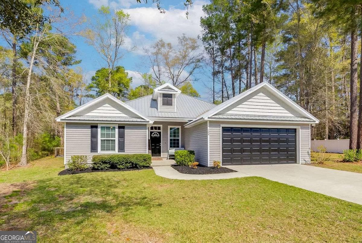 4 bedroom, 2 bathroom, 1,940 sq ft single family residence for sale at 104 Southbrook Drive, Guyton, GA 31312 — photo 2