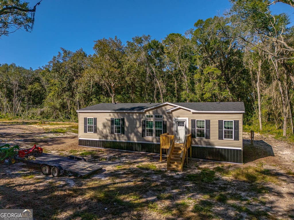 4 bedroom, 2 bathroom, 1,542 sq ft manufactured home,single family residence for sale at 2139 NE Susie Baker Road, Townsend, GA 31331 — photo 7