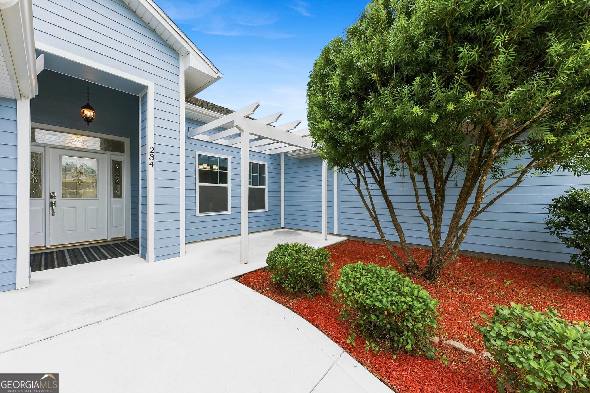 4 bedroom, 2.5 bathroom, 1,955 sq ft single family residence for sale at 234 Hide Away Lake Drive, Kingsland, GA 31548 — photo 3