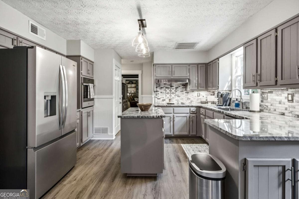 4 bedroom, 2.5 bathroom, 2,948 sq ft single family residence for sale at 526 Wagon Wheel Climb, Lawrenceville, GA 30044 — photo 2