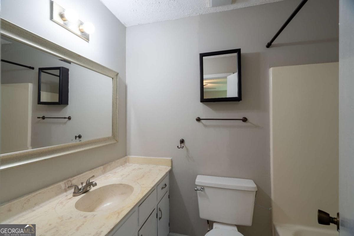 3 bedroom, 2 bathroom, 1,334 sq ft single family residence for sale at 3230 Halifax Drive, Cumming, GA 30041 — photo 9