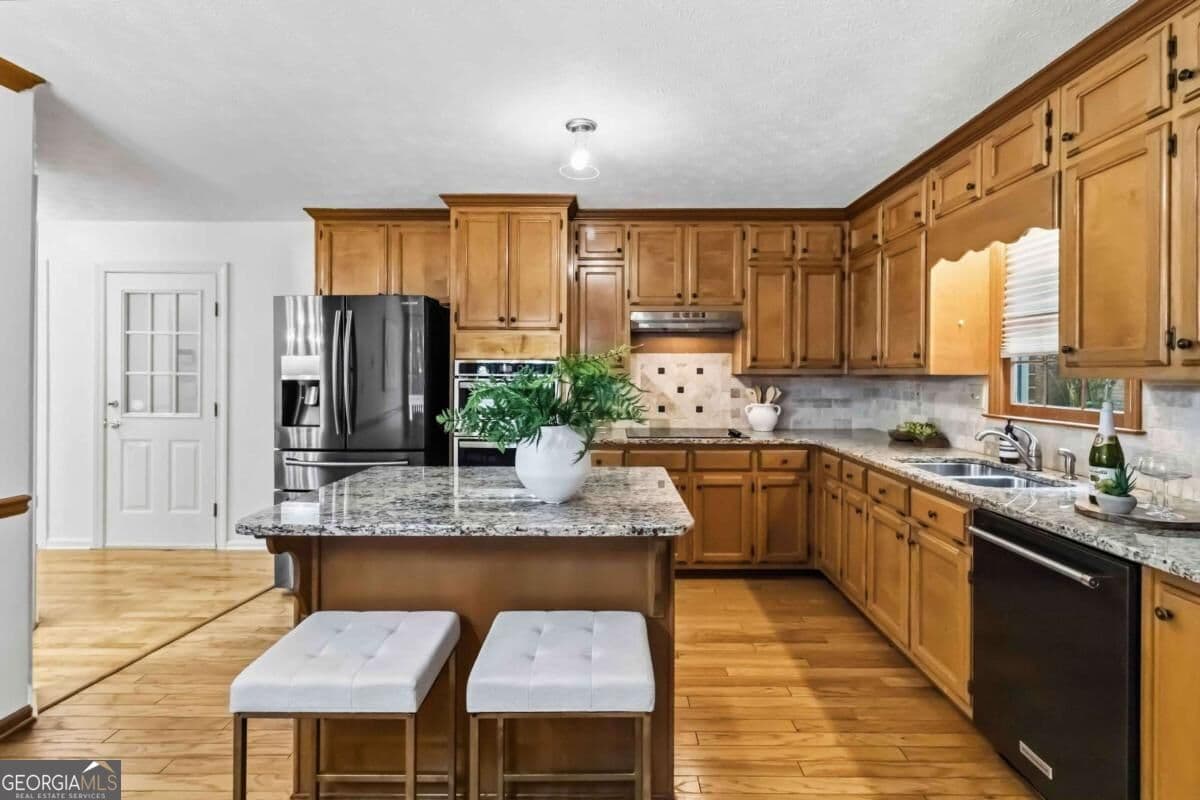 4 bedroom, 2.5 bathroom, 2,686 sq ft single family residence for sale at 4405 Clipper Bay Road, Duluth, GA 30096 — photo 4