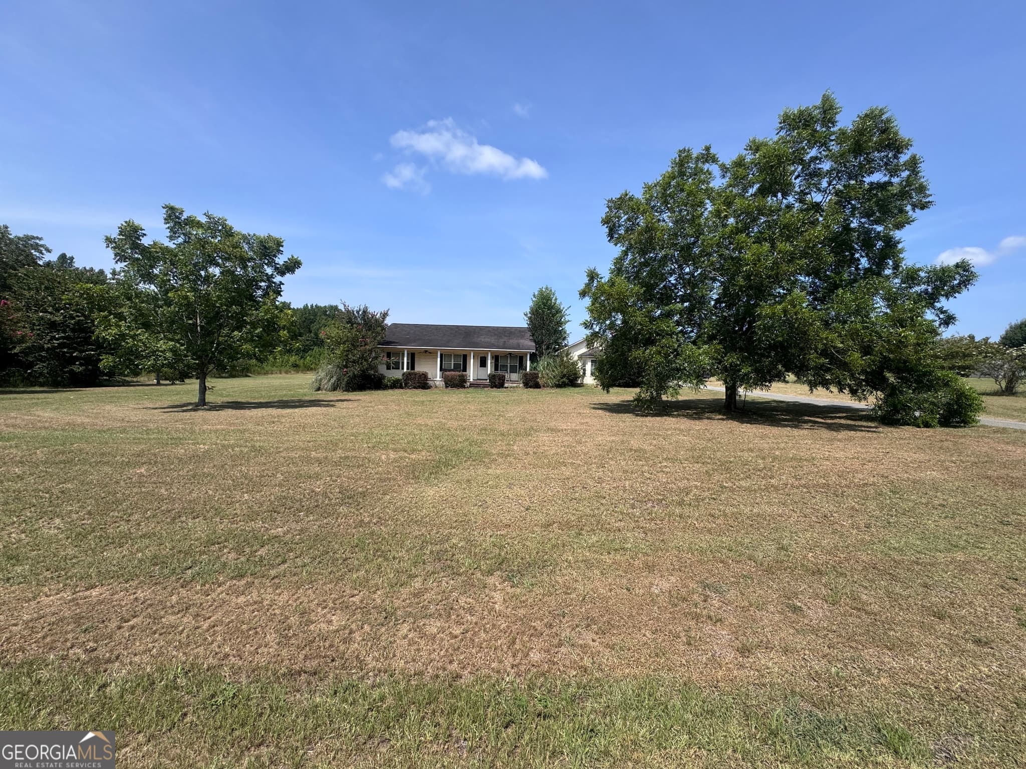 4 bedroom, 2 bathroom, 1,882 sq ft single family residence for sale at 1427 Coleman Register Road, Rentz, GA 31075 — photo 2
