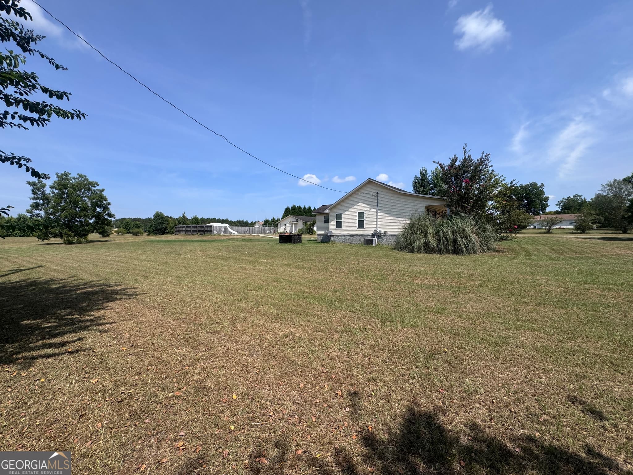 4 bedroom, 2 bathroom, 1,882 sq ft single family residence for sale at 1427 Coleman Register Road, Rentz, GA 31075 — photo 4