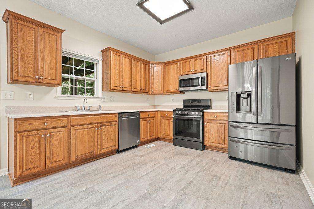 4 bedroom, 2.5 bathroom, 1,672 sq ft single family residence for sale at 12 Paces Lakes Overlook, Dallas, GA 30157 — photo 10