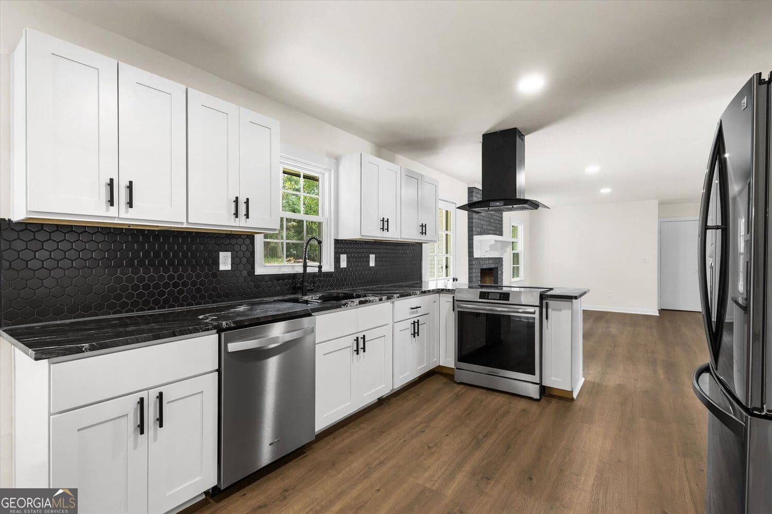 3 bedroom, 2 bathroom, 3,833 sq ft single family residence for sale at 1674 Lamancha Drive, Lawrenceville, GA 30044 — photo 2