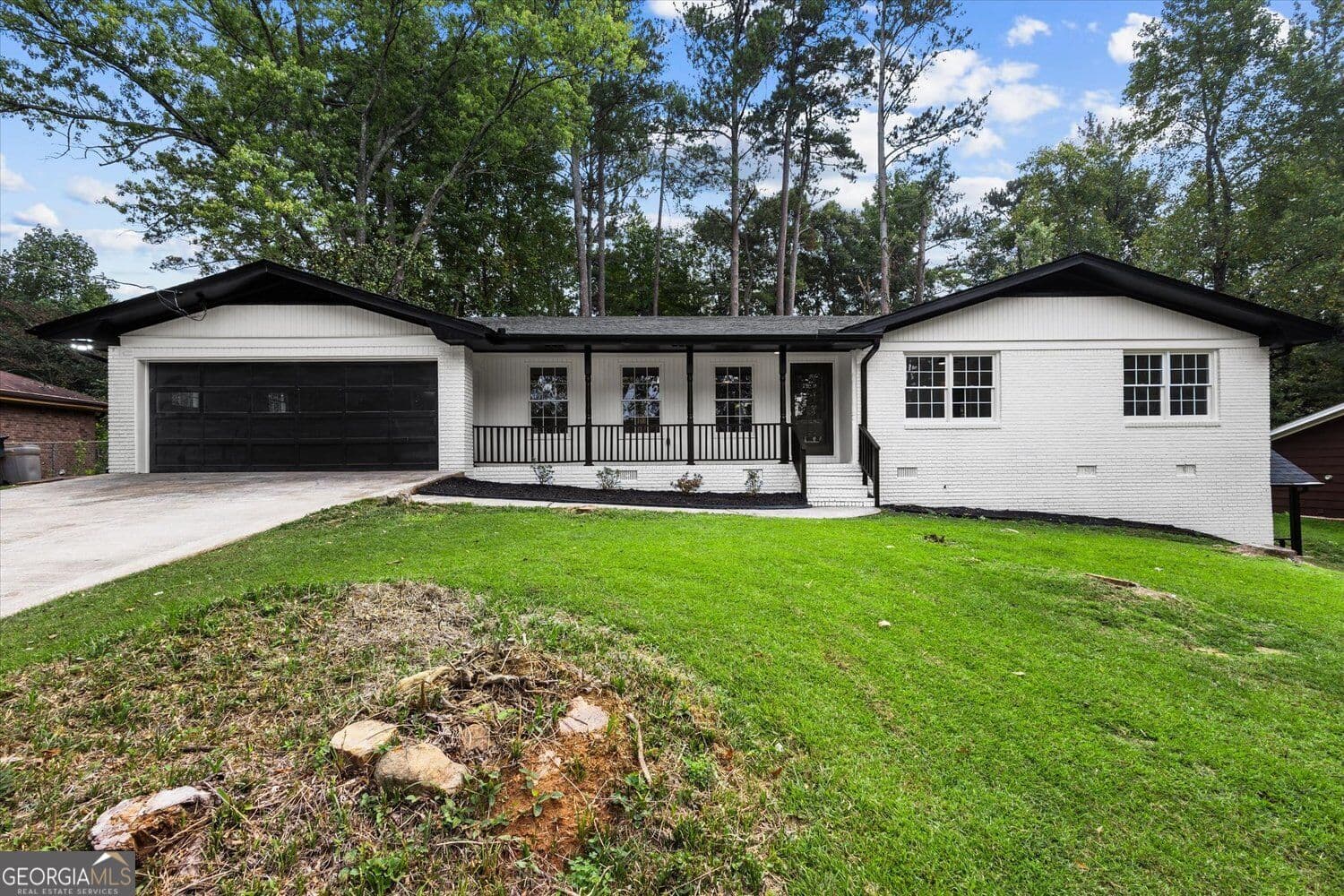 3 bedroom, 2 bathroom, 3,833 sq ft single family residence for sale at 1674 Lamancha Drive, Lawrenceville, GA 30044 — photo 1 of 58