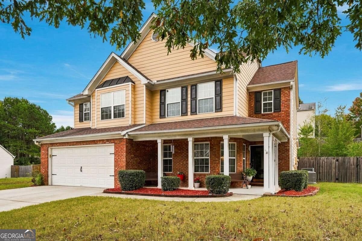 4 bedroom, 2.5 bathroom, 2,128 sq ft single family residence for sale at 825 Shannon Road, Loganville, GA 30052 — photo 3