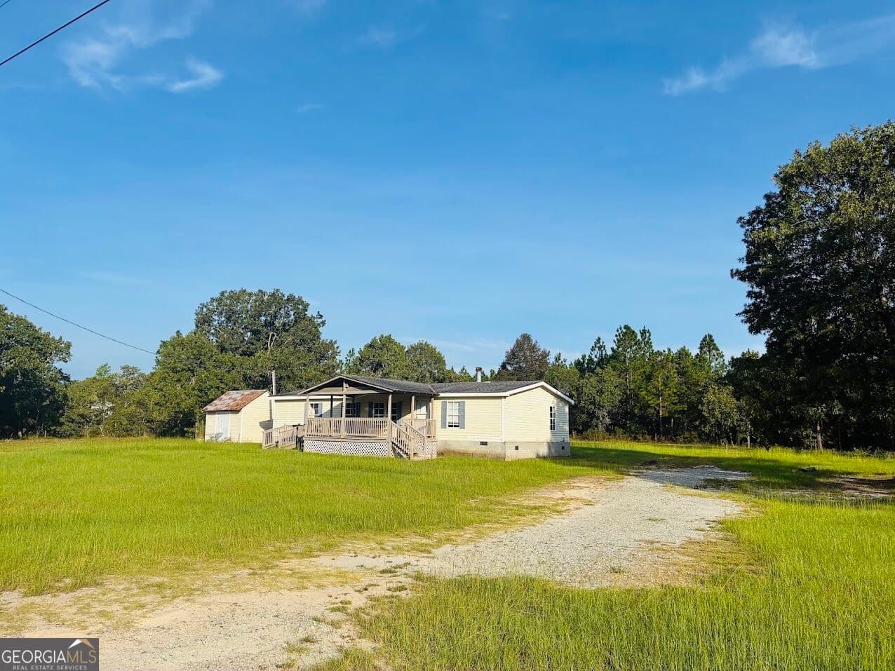 3 bedroom, 2 bathroom, 1,456 sq ft manufactured home,single family residence for sale at 251 Moores Chapel Road, Mauk, GA 31058 — photo 6