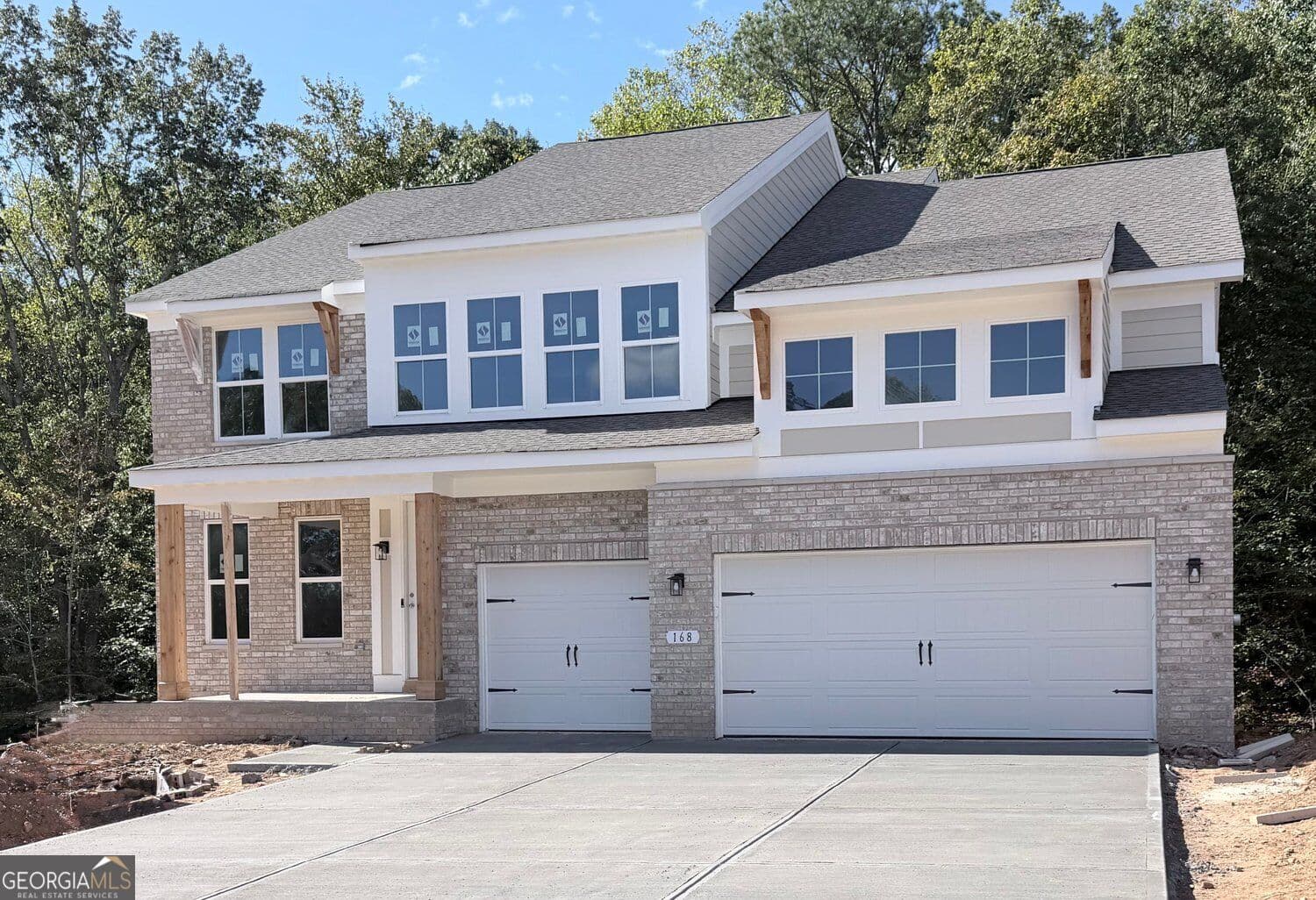 4 bedroom, 4.5 bathroom, 4,393 sq ft single family residence for sale at 168 Wood Grove Lane, Canton, GA 30114 — photo 1 of 2