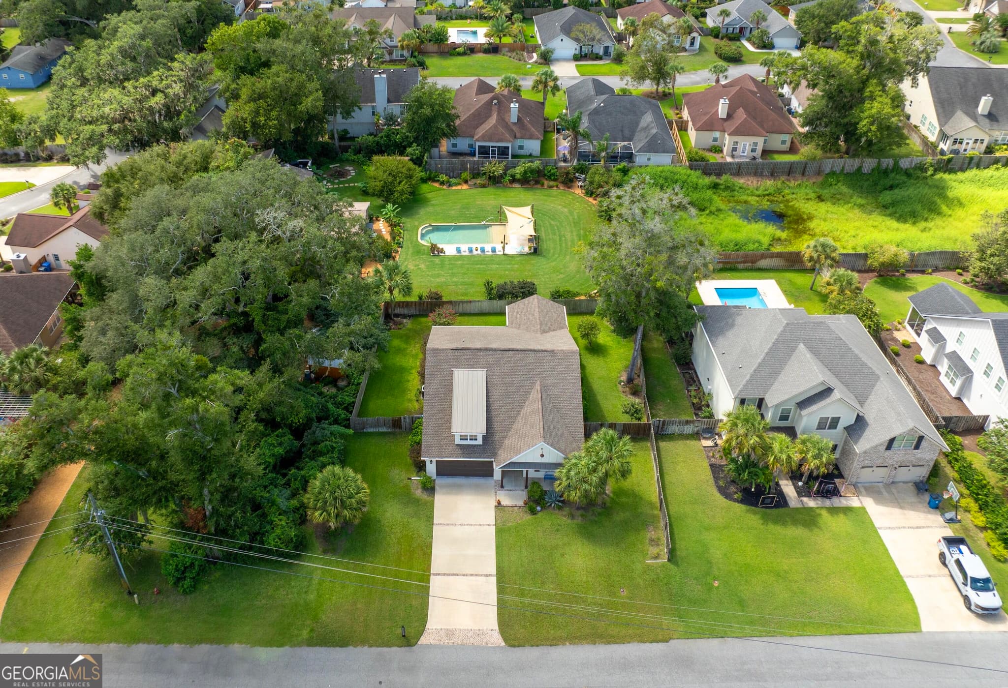 4 bedroom, 3.5 bathroom, 2,265 sq ft single family residence for sale at 143 Harrington Lane, St. Simons, GA 31522