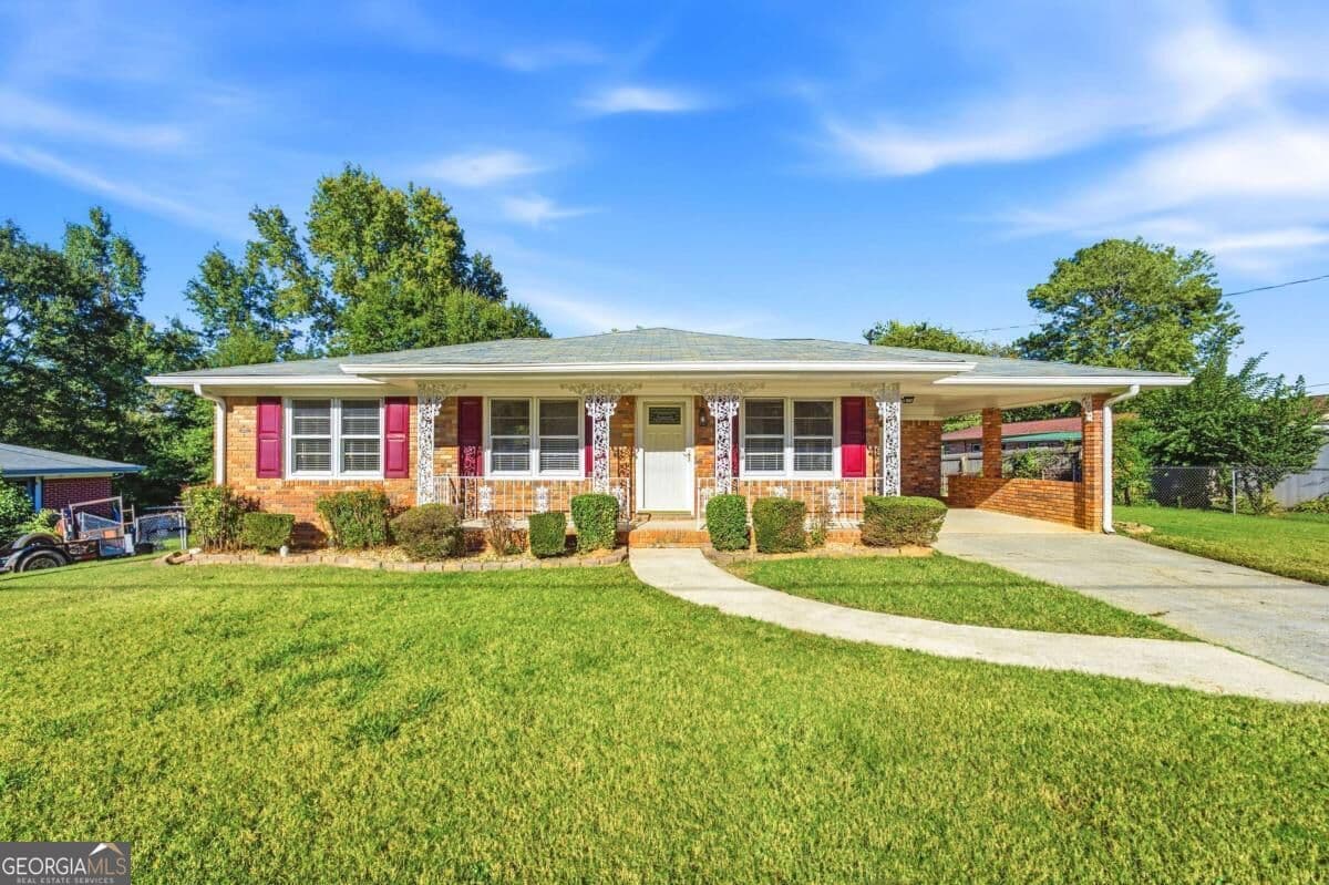 3 bedroom, 1.5 bathroom, 988 sq ft single family residence for sale at 5911 Betty Street, Austell, GA 30106 — photo 2
