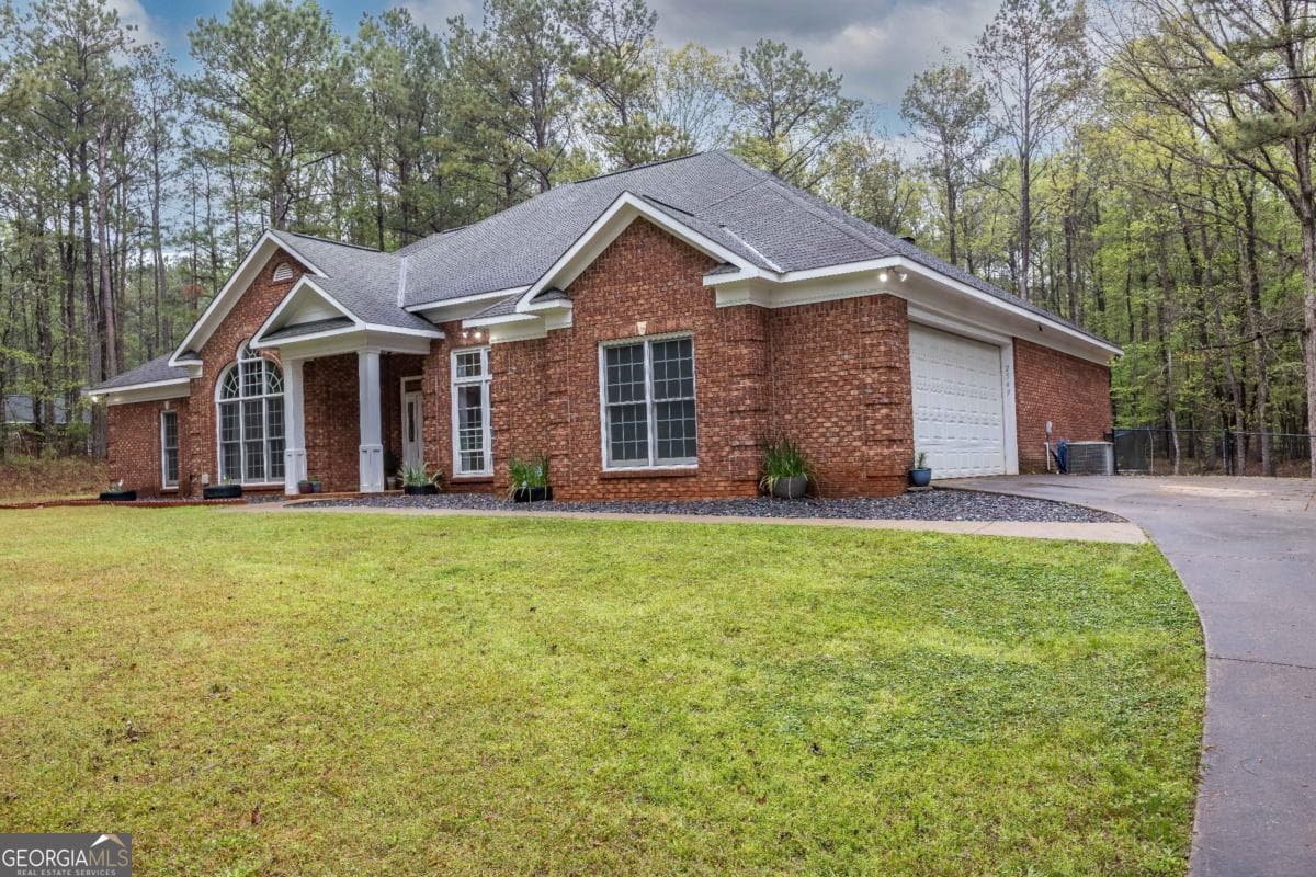 4 bedroom, 3 bathroom single family residence sold at 2549 Central Church Road, Midland, GA 31820