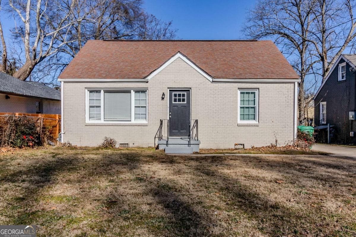 4 bedroom, 1 bathroom, 957 sq ft single family residence for sale at 2446 Lynn Iris Drive, Decatur, GA 30032 — photo 1 of 26
