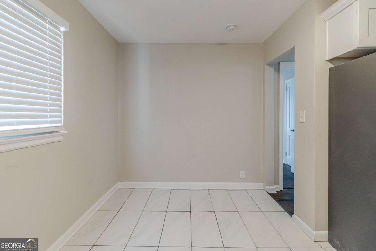 4 bedroom, 1 bathroom, 957 sq ft single family residence for sale at 2446 Lynn Iris Drive, Decatur, GA 30032 — photo 4