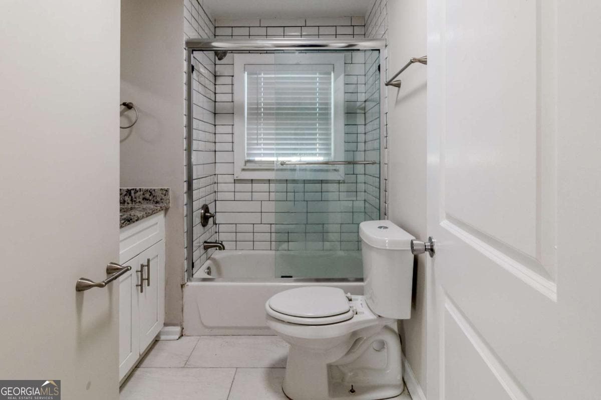4 bedroom, 1 bathroom, 957 sq ft single family residence for sale at 2446 Lynn Iris Drive, Decatur, GA 30032 — photo 8