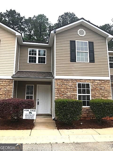 4 bedroom, 3 bathroom, 1,624 sq ft townhouse for sale at 128 Heritage Way, Jackson, GA 30233 — photo 1 of 33