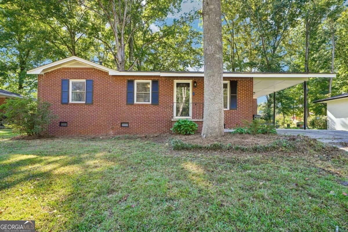 4 bedroom, 2 bathroom, 1,395 sq ft single family residence for sale at 493 Shady Lane, Forest Park, GA 30297 — photo 2